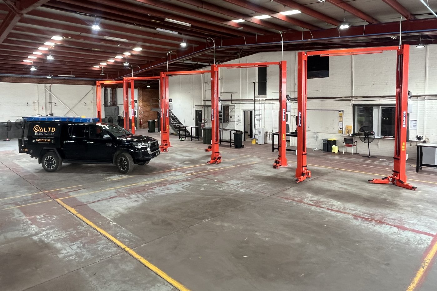 Commercial workshop interior with high-bay lighting installed by SALTD Electrical