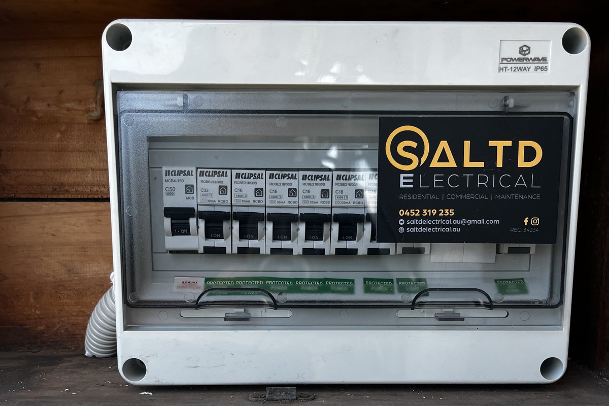 Replacement switchboard in a sealed enclosure with an RCBO on every circuit, labelled and certified by SALTD Electrical